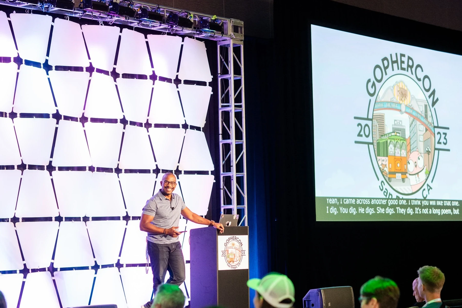 Johnny Boursiquot speaking at GopherCon 2023
